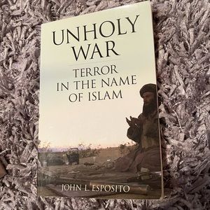 Unholy War book. Good used condition.